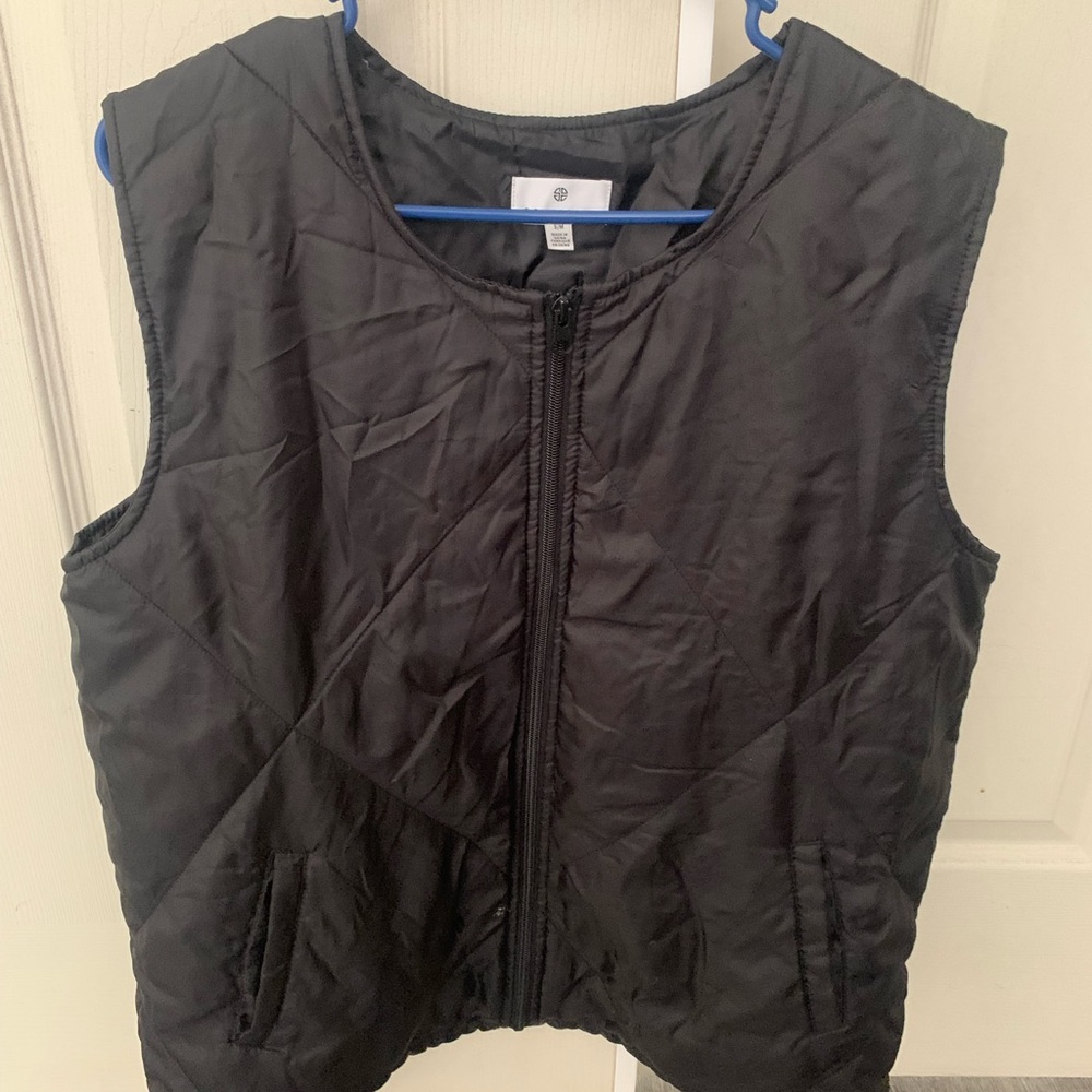 Women’s Black sleeveless vest from Socialite